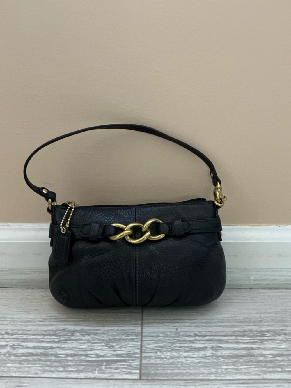 Coach Eggplant Leather Wristlet with Gold Chain Accent
